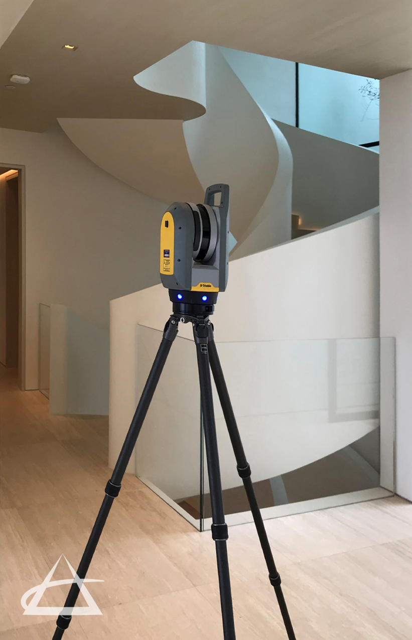 Trimble X7 Scanner near staircase.