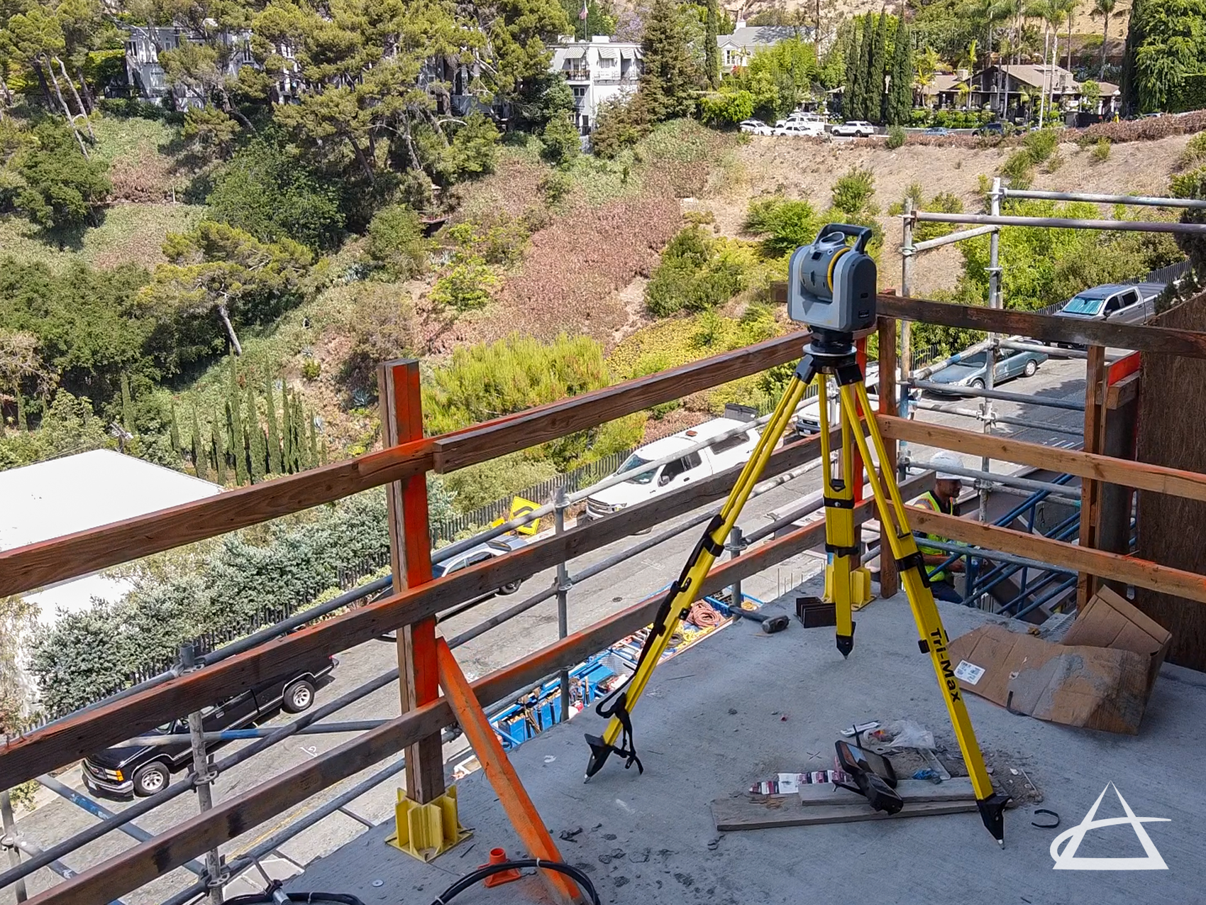 Trimble SX-10 scanning a construction site.